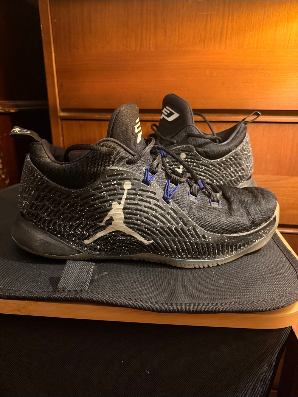 Jordan Men's Black Athletic Shoes with Blue Accents